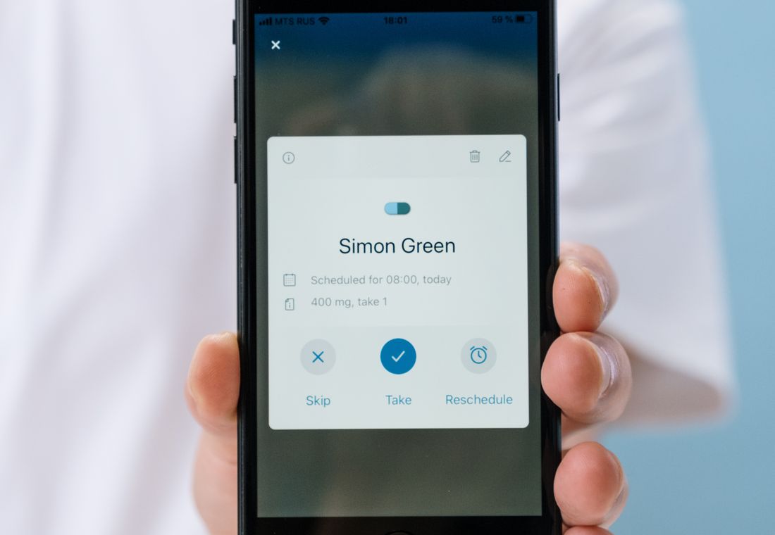 A person using a healthcare app on a smartphone